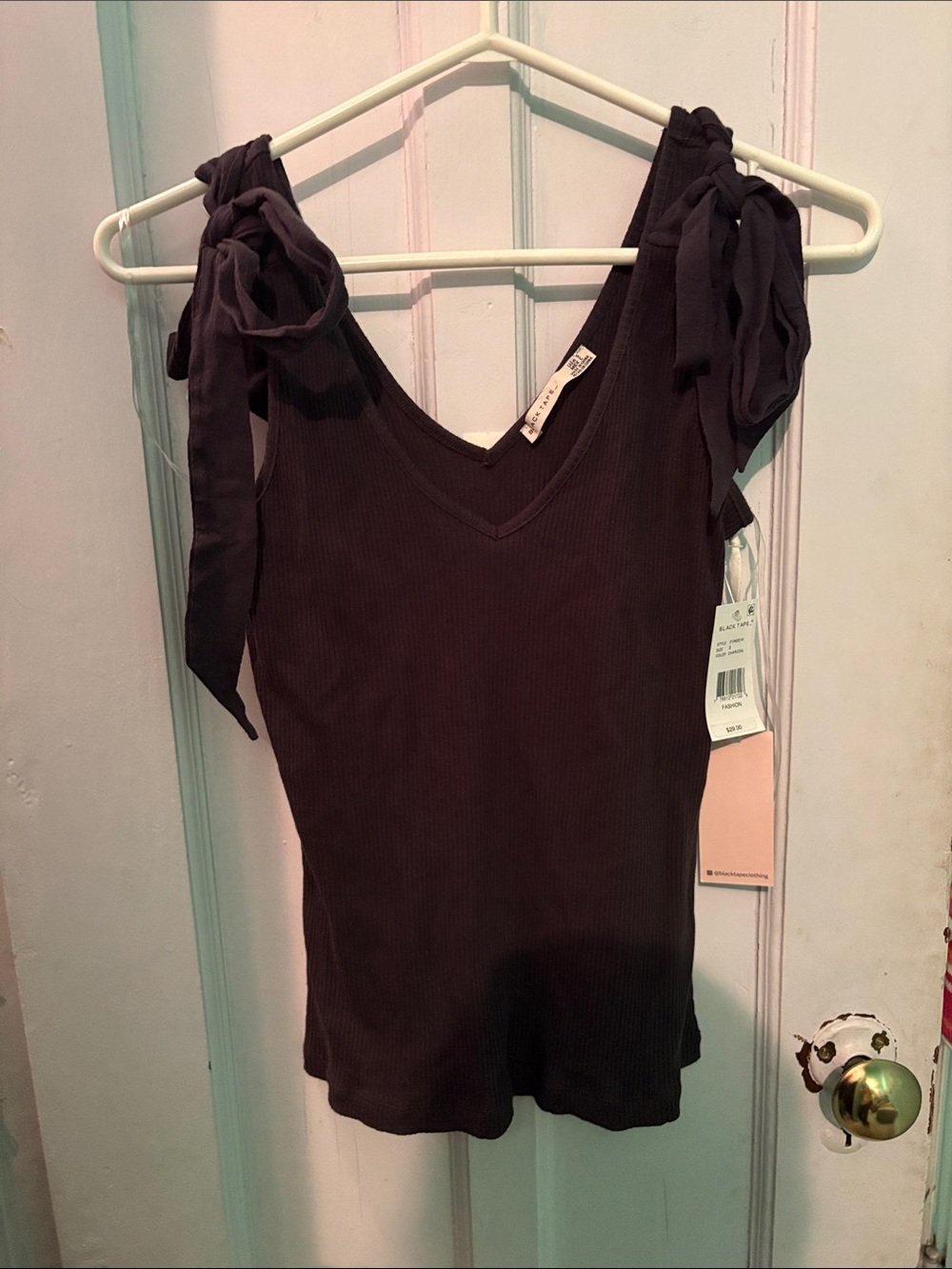 Black Tape_ clothing shoulder knot sleeveless ribbed tank
